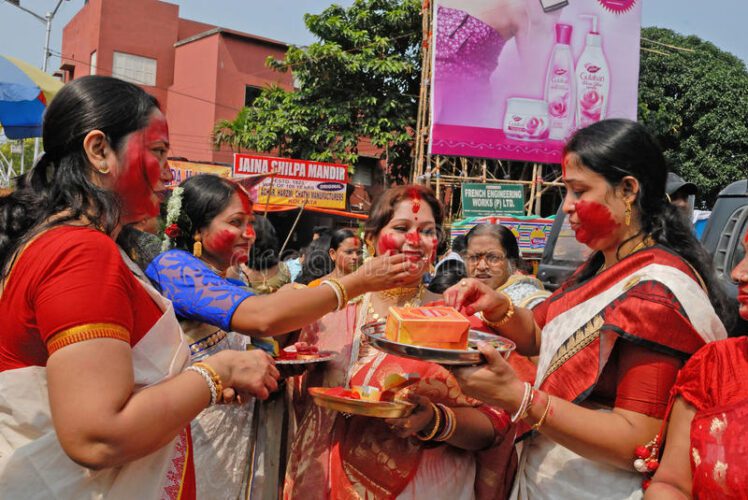 Indian locals celebrating durga puja