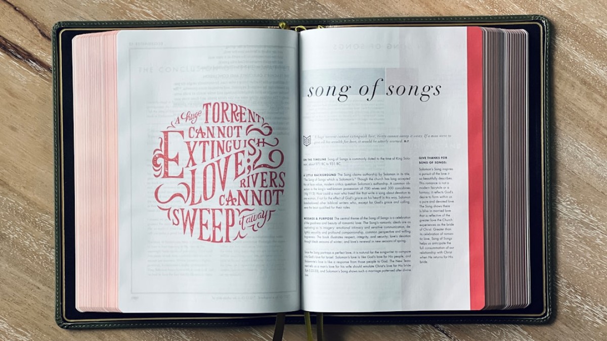 Open bible, with "song of songs" displayed.