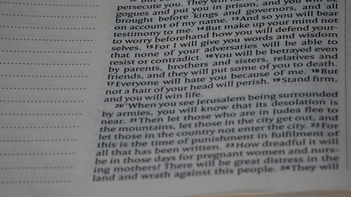 A close up of a book with a page in it