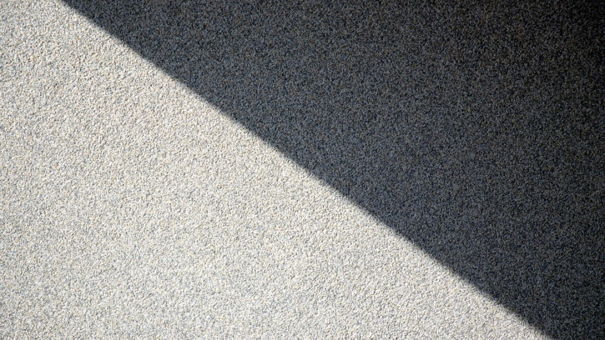 black textile on gray textile