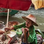 An Old Lady selling in Floating Market Bangkok