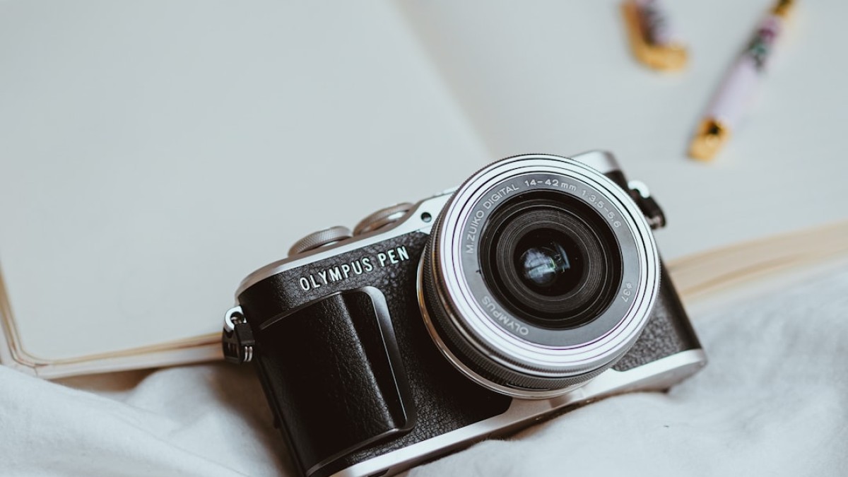 black and silver canon dslr camera