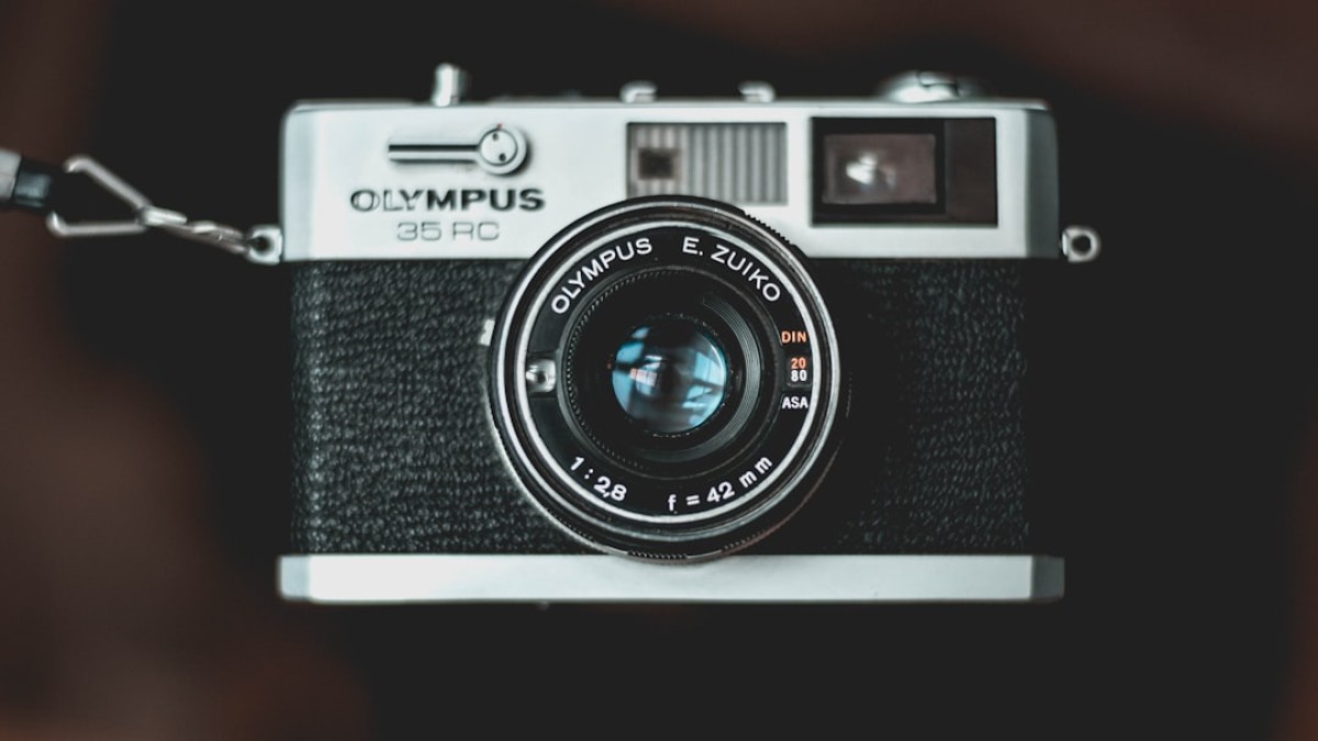black and gray Olympus 35 RC camera