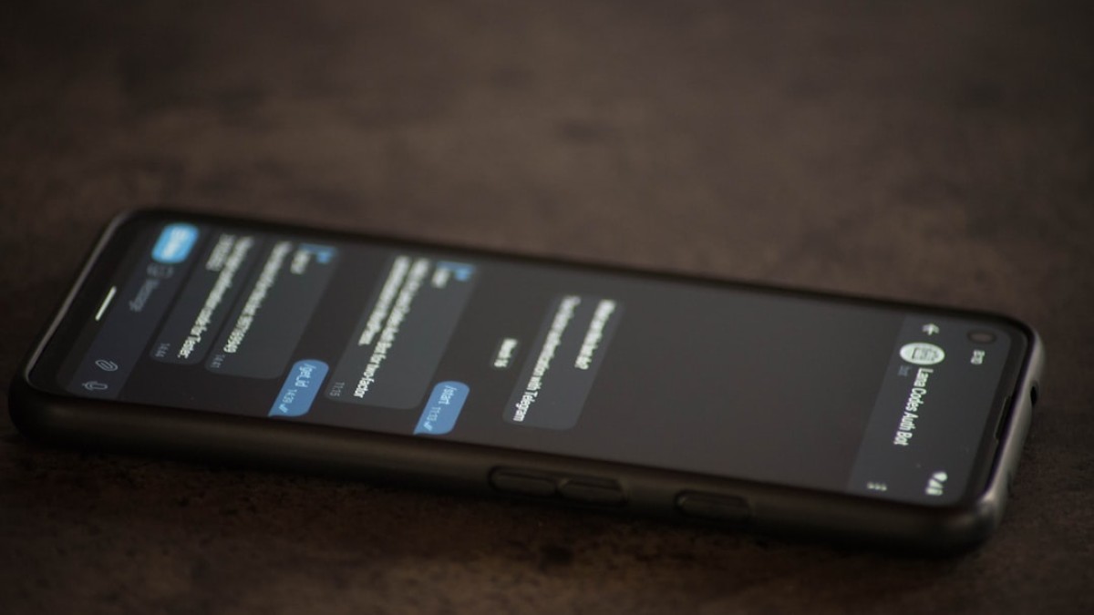 a close up of a cell phone on a table
