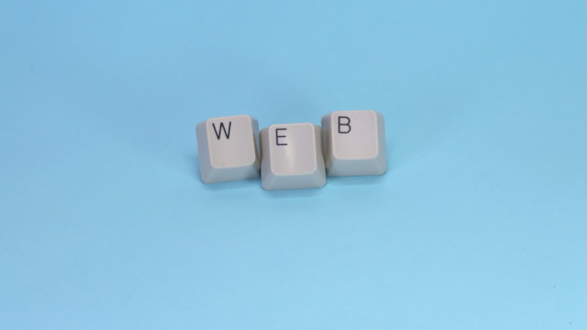 Keyboard keys spell out the word "web."
